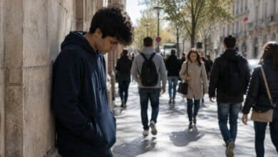 how to overcome shyness shy young man alone in city street
